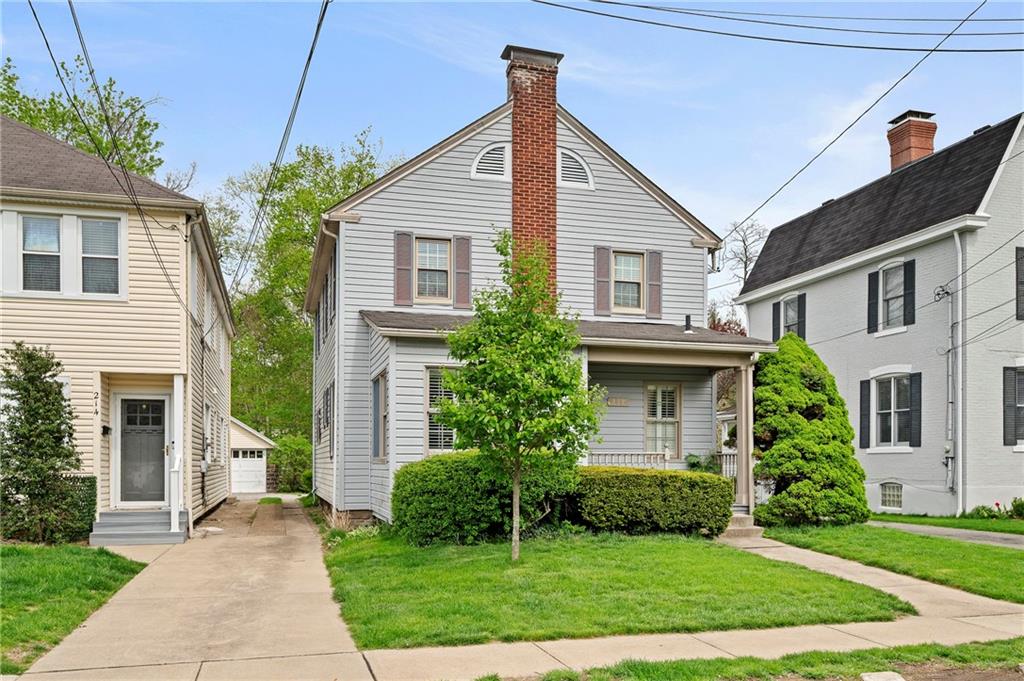 212 Pine Road Sewickley, PA 15143 - Photo 30 of 33 Positioned on a quiet residential street, the home offers a classic neighborhood setting with sidewalks and a welcoming streetscape. A simple, approachable exterior supports an easy, low-maintenance lifestyle.