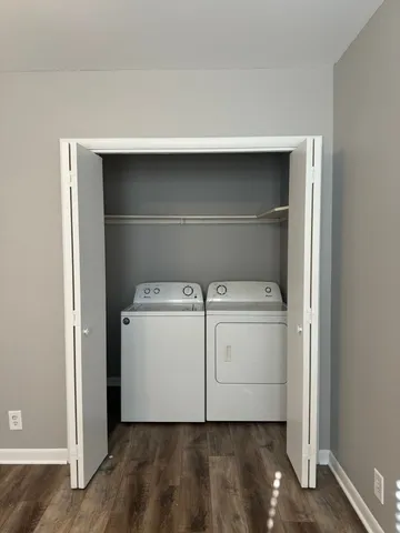 a utility room with dryer and washer
