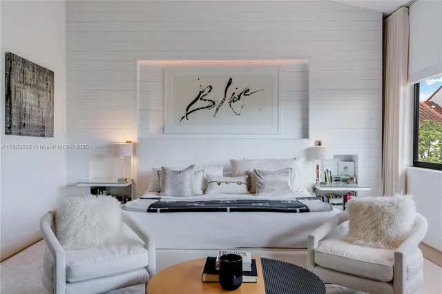 a living room with furniture and window