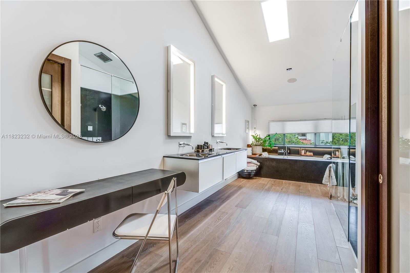 2000 South Bayshore Drive, Unit 47 Miami, FL 33133 - Photo 13 of 22 a large white kitchen with a large window