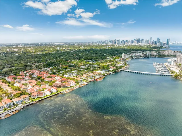a view of a lake with a city