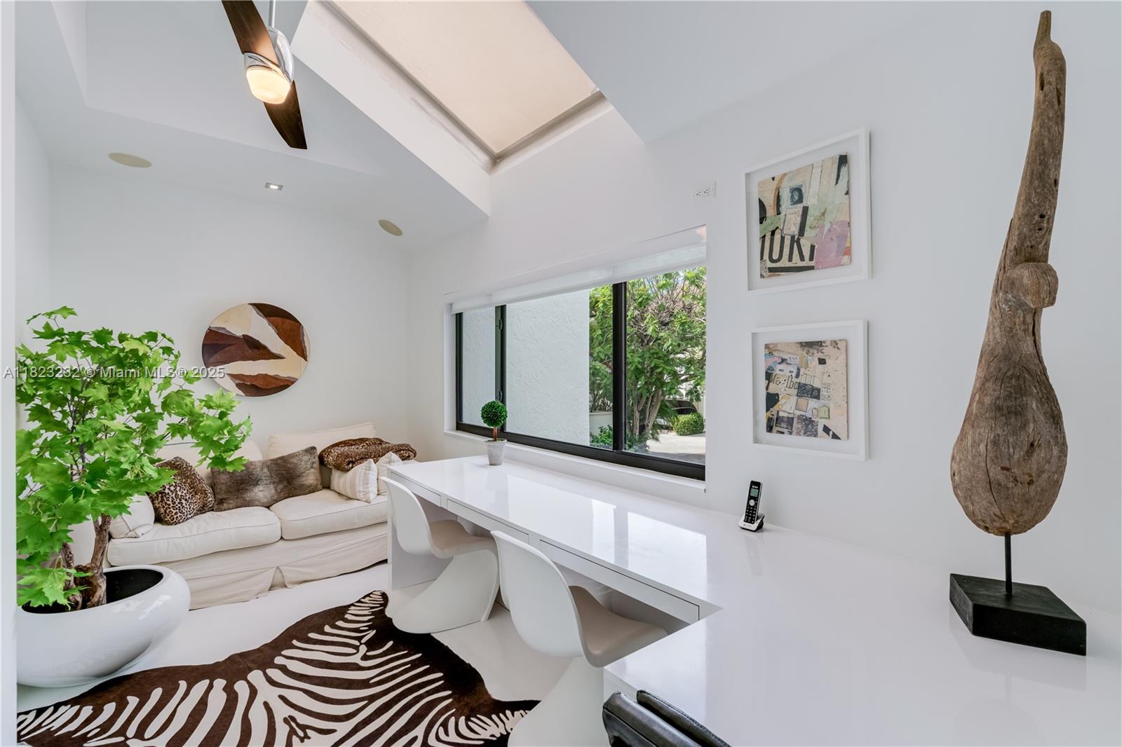 2000 South Bayshore Drive, Unit 47 Miami, FL 33133 - Photo 7 of 22 a living room with furniture and a window