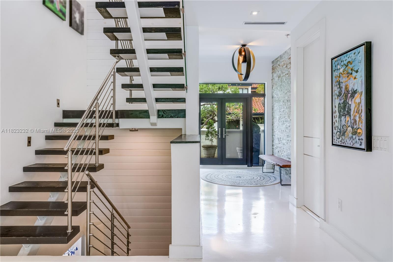 2000 South Bayshore Drive, Unit 47 Miami, FL 33133 - Photo 9 of 22 a view of entryway and hall with wooden floor