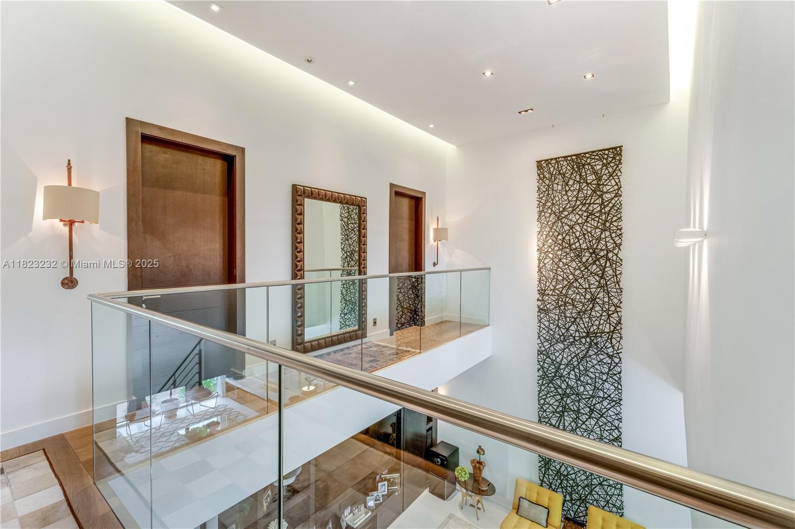 2000 South Bayshore Drive, Unit 47 Miami, FL 33133 - Photo 10 of 22 a view of a hallway with furniture and wooden floor