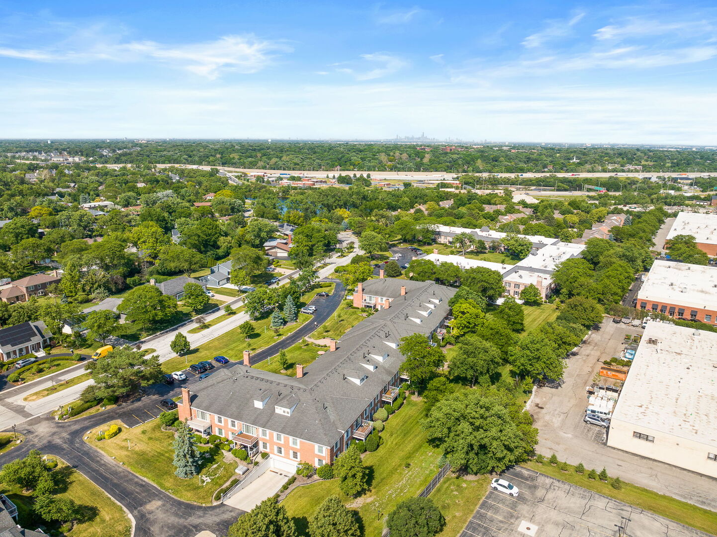 124 Carriage Way Drive, Unit B109 Burr Ridge, IL 60527 - Photo 29 of 31 an aerial view of residential houses with outdoor space