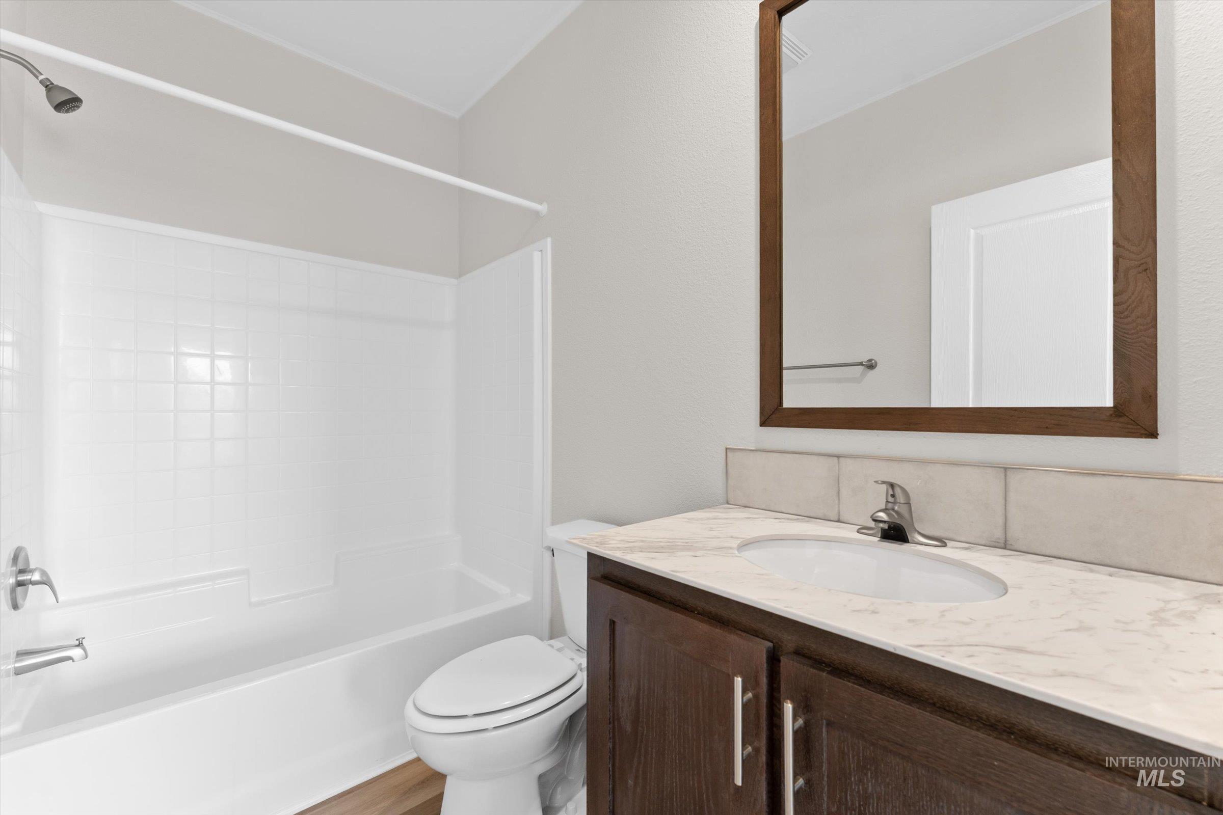 421 South Curtis Road, Unit 34 34 Boise, ID 83705 - Photo 14 of 22 Bathroom with shower / bath combination and vanity