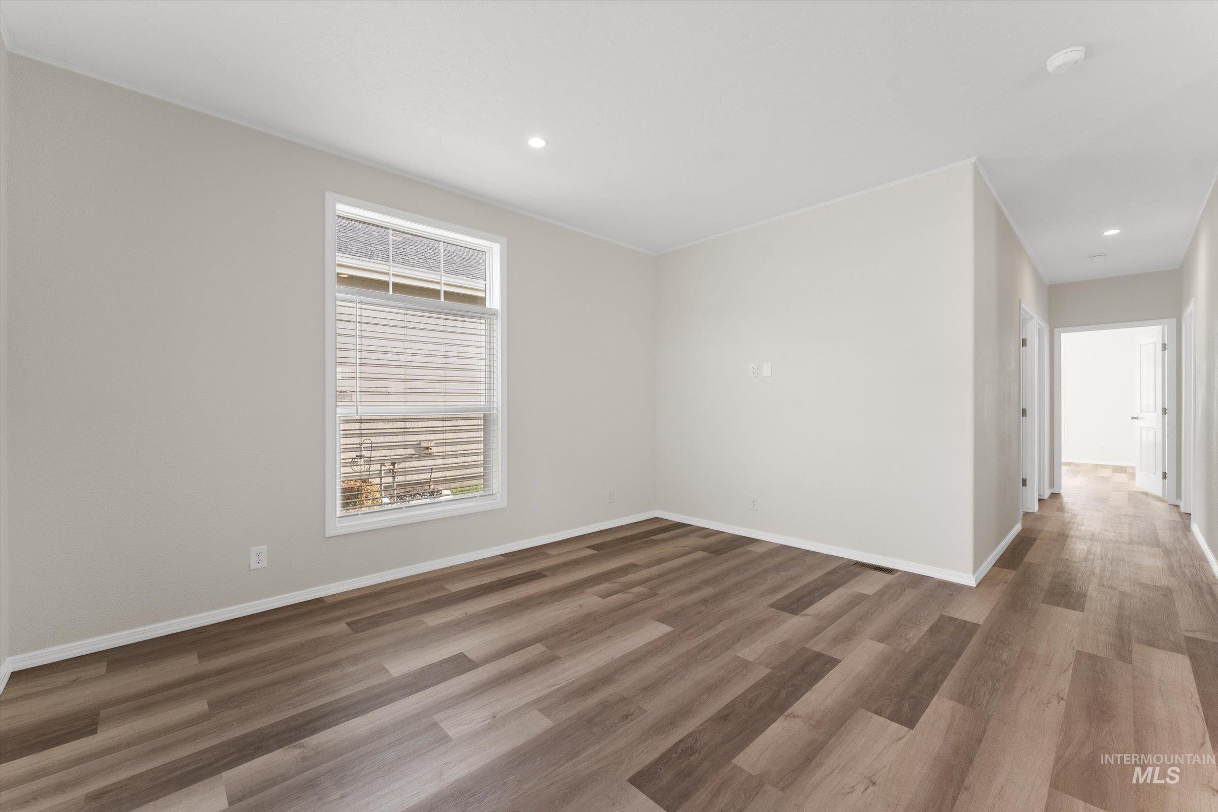 421 South Curtis Road, Unit 34 34 Boise, ID 83705 - Photo 8 of 22 Spare room featuring wood finished floors and recessed lighting