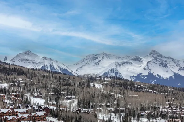 a view of house with small swimming pool