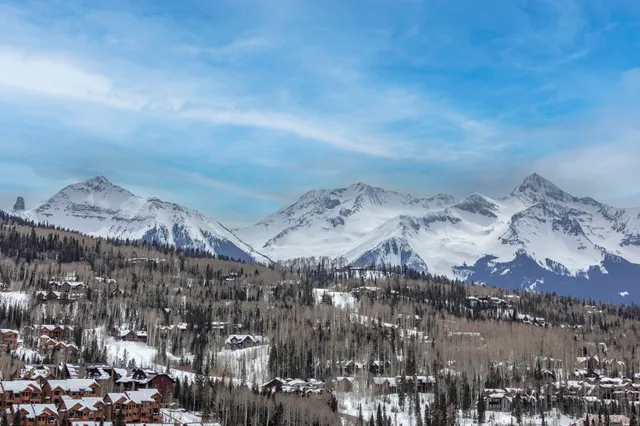 a view of house with small swimming pool