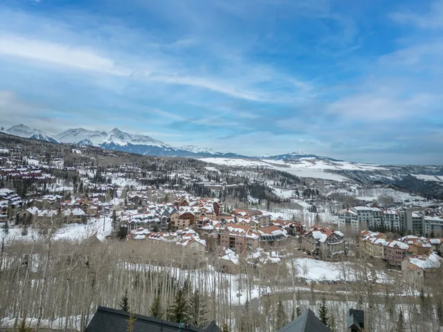 a view of swimming pool with a yard