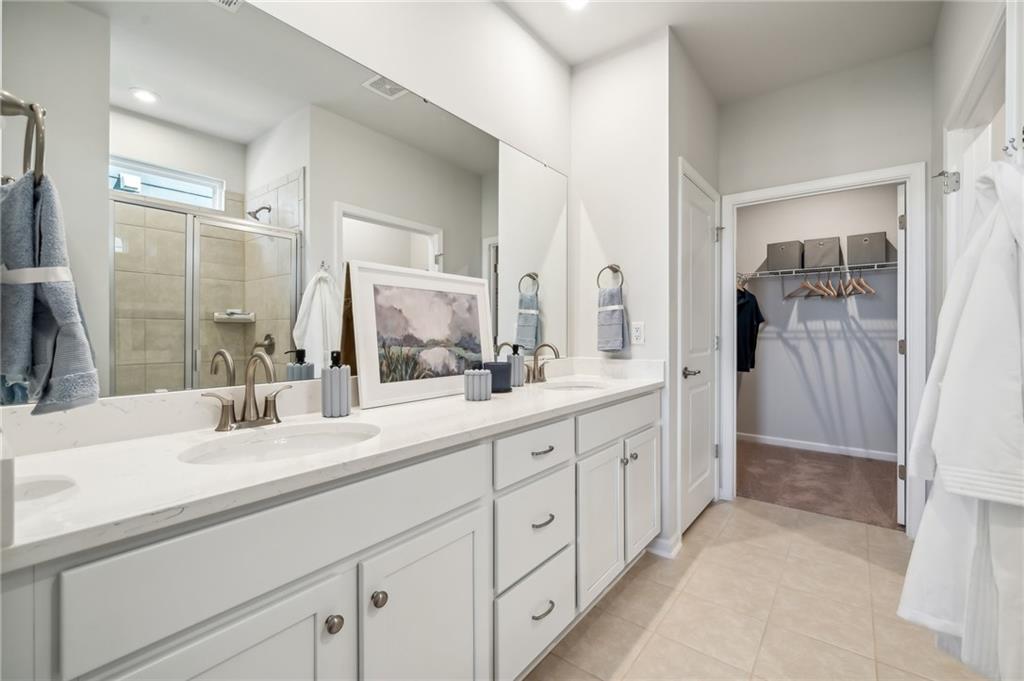318 Cavalier Lane Acworth, GA 30102 - Photo 14 of 47 a spacious bathroom with double sink and a mirror