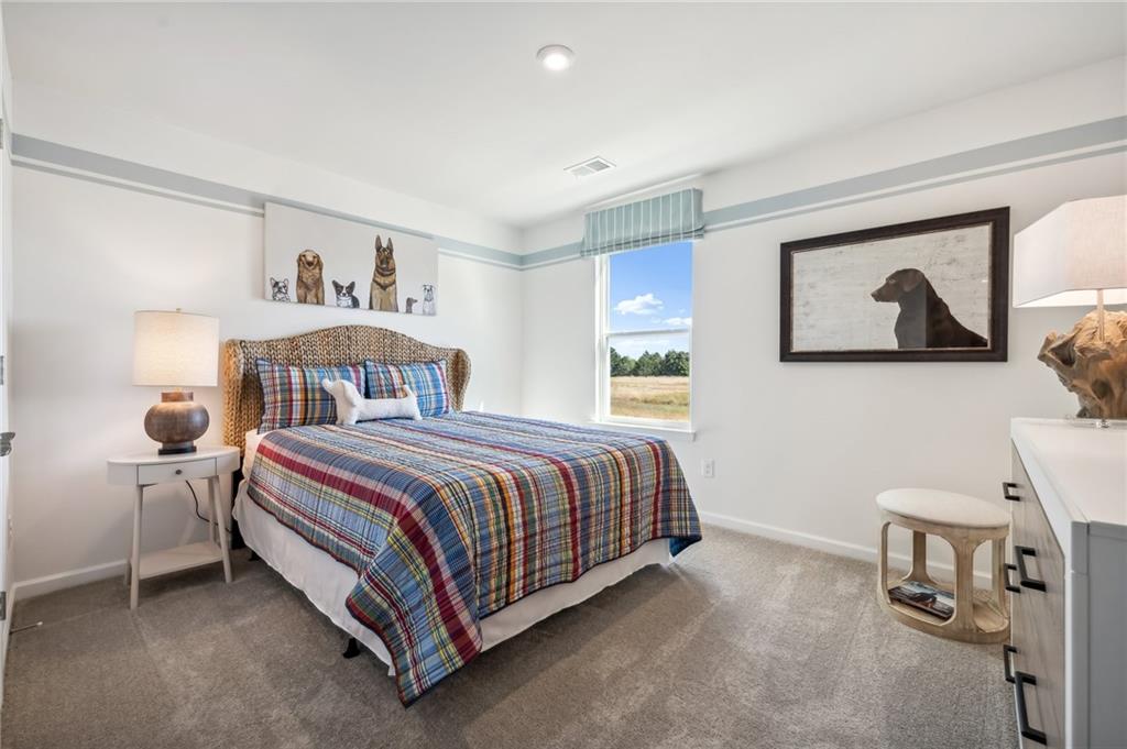 318 Cavalier Lane Acworth, GA 30102 - Photo 20 of 47 a bedroom with a bed and a window