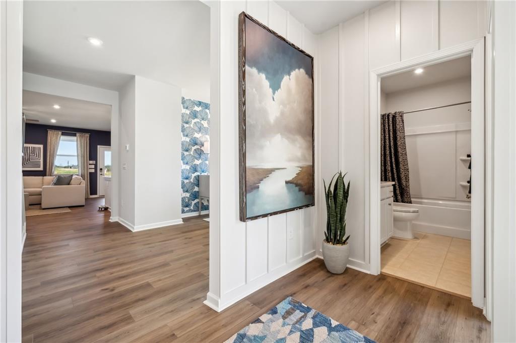 318 Cavalier Lane Acworth, GA 30102 - Photo 2 of 47 a view of a hallway view with wooden floor and entryway