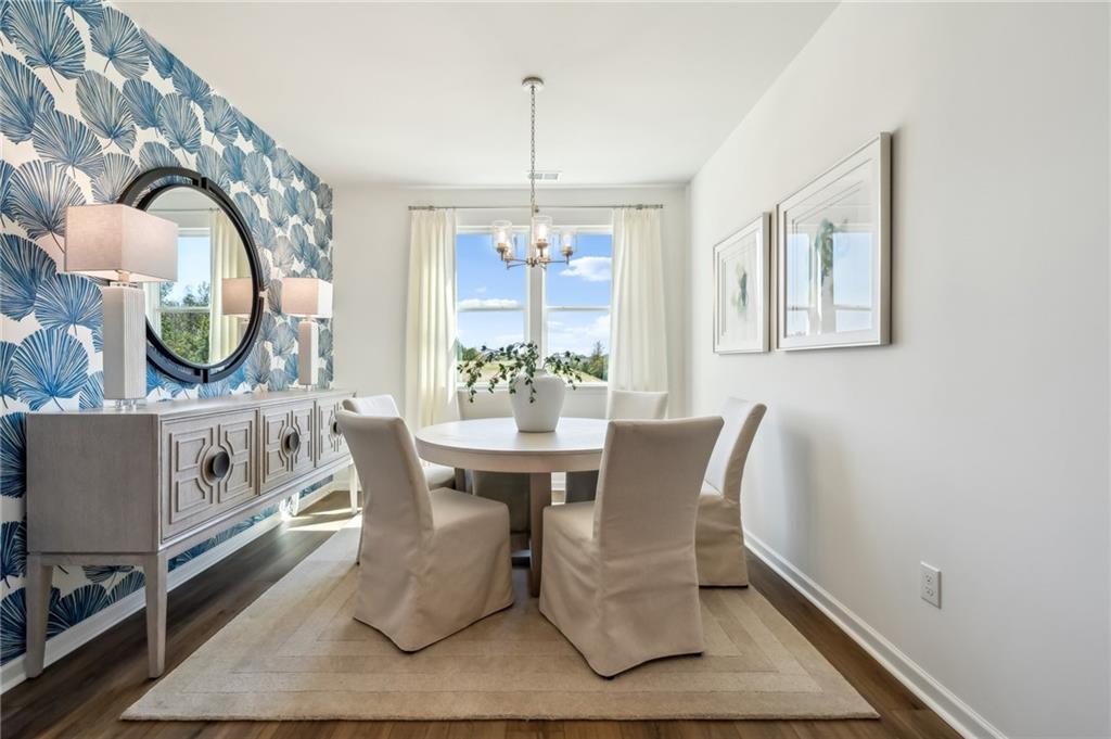 318 Cavalier Lane Acworth, GA 30102 - Photo 4 of 47 a view of a dining room with furniture window and wooden floor
