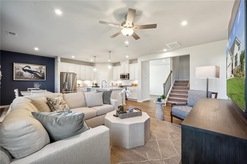 318 Cavalier Lane Acworth, GA 30102 - Photo 6 of 47 a living room with furniture and kitchen view
