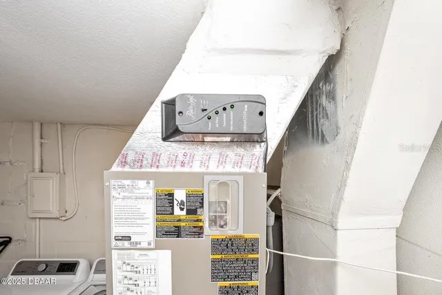 a view of living room with furniture and window