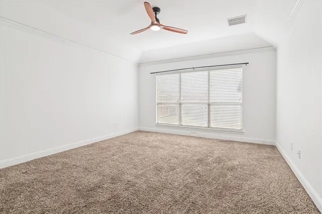 an empty room with a empty space and a window