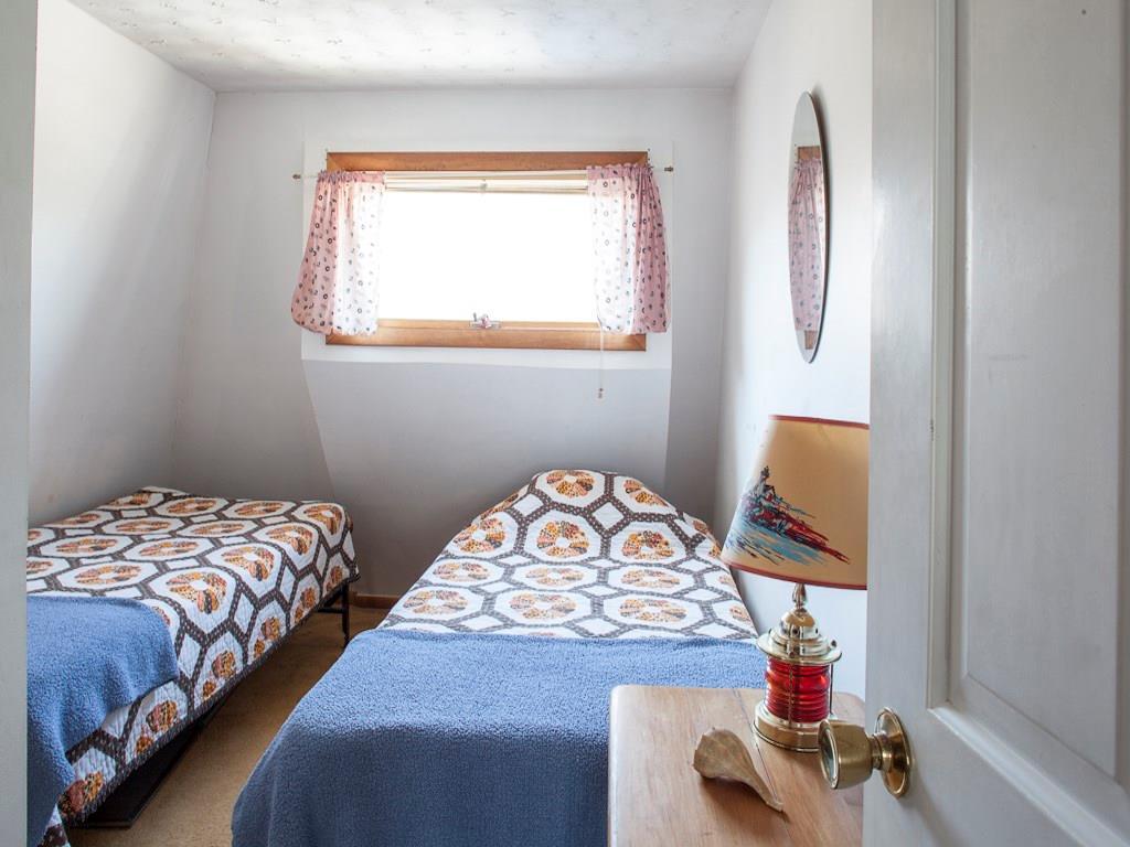 258 Hills Beach Road Biddeford, ME 04005 - Photo 21 of 28 The third bedroom is small but adequate.