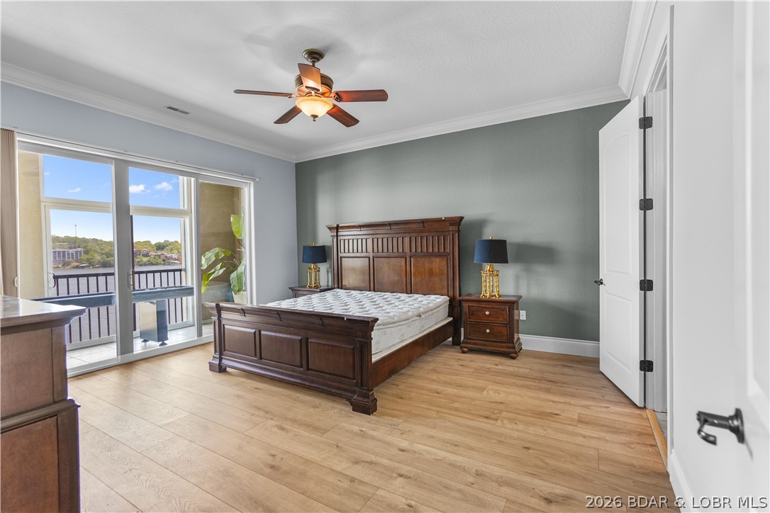 1184 Jeffries Road, Unit 416 Osage Beach, MO 65065 - Photo 11 of 62 Bedroom with lakeview