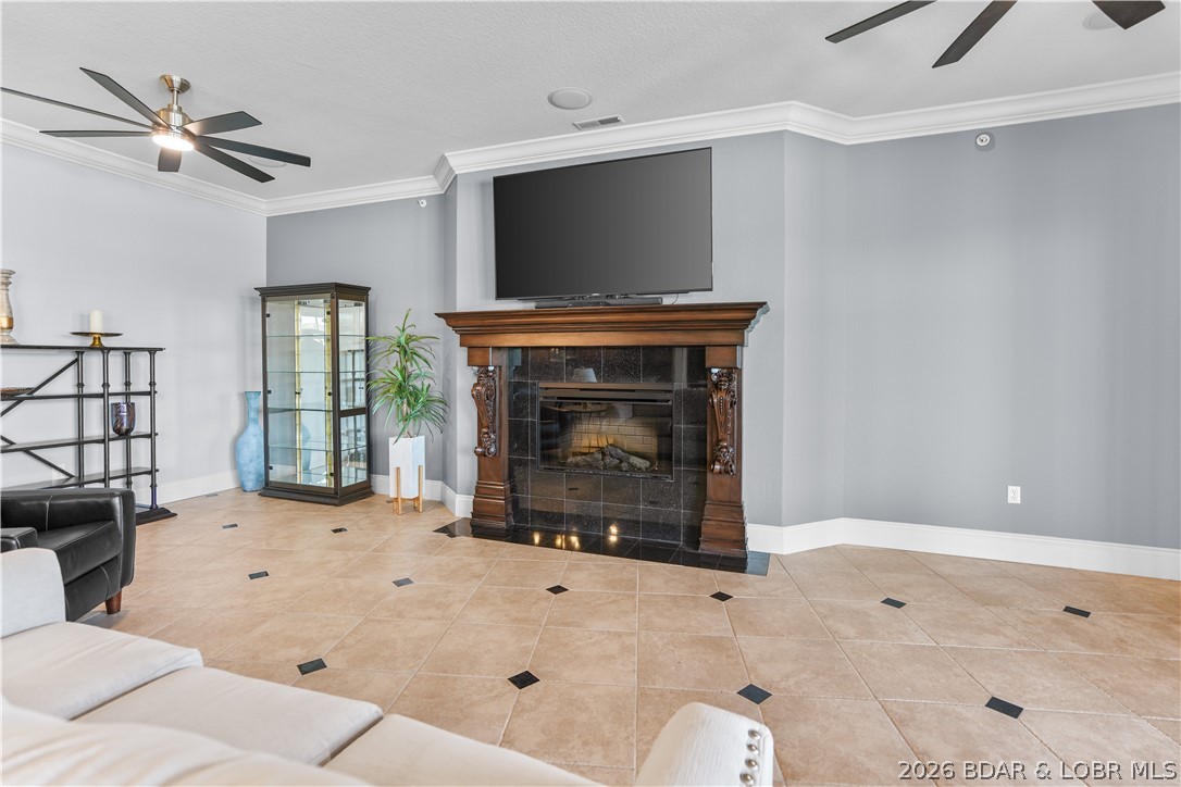 1184 Jeffries Road, Unit 416 Osage Beach, MO 65065 - Photo 42 of 62 Living room fireplace