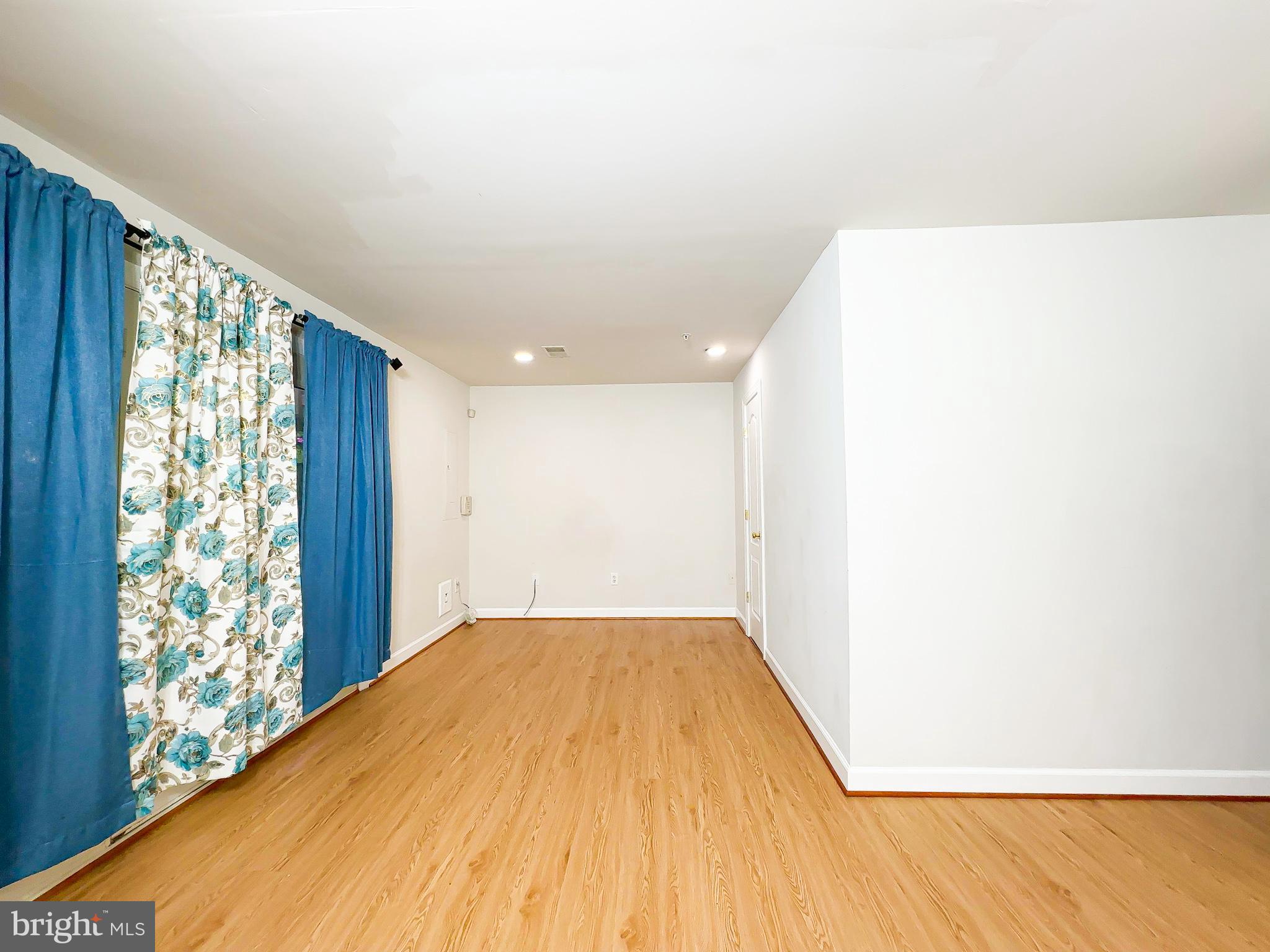 2016 Wheaton Haven Court Silver Spring, MD 20902 - Photo 2 of 10 a view of a big room with windows