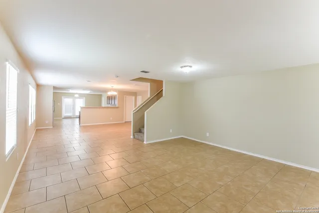 a view of a hallway with a white walls