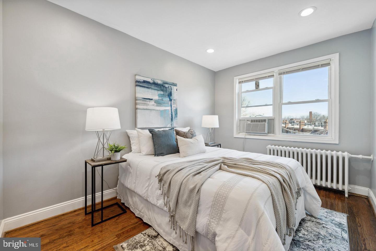 909 19th Street Northeast, Unit 2 Washington, DC 20002 - Photo 11 of 21 Bright and airy bedroom with city views.