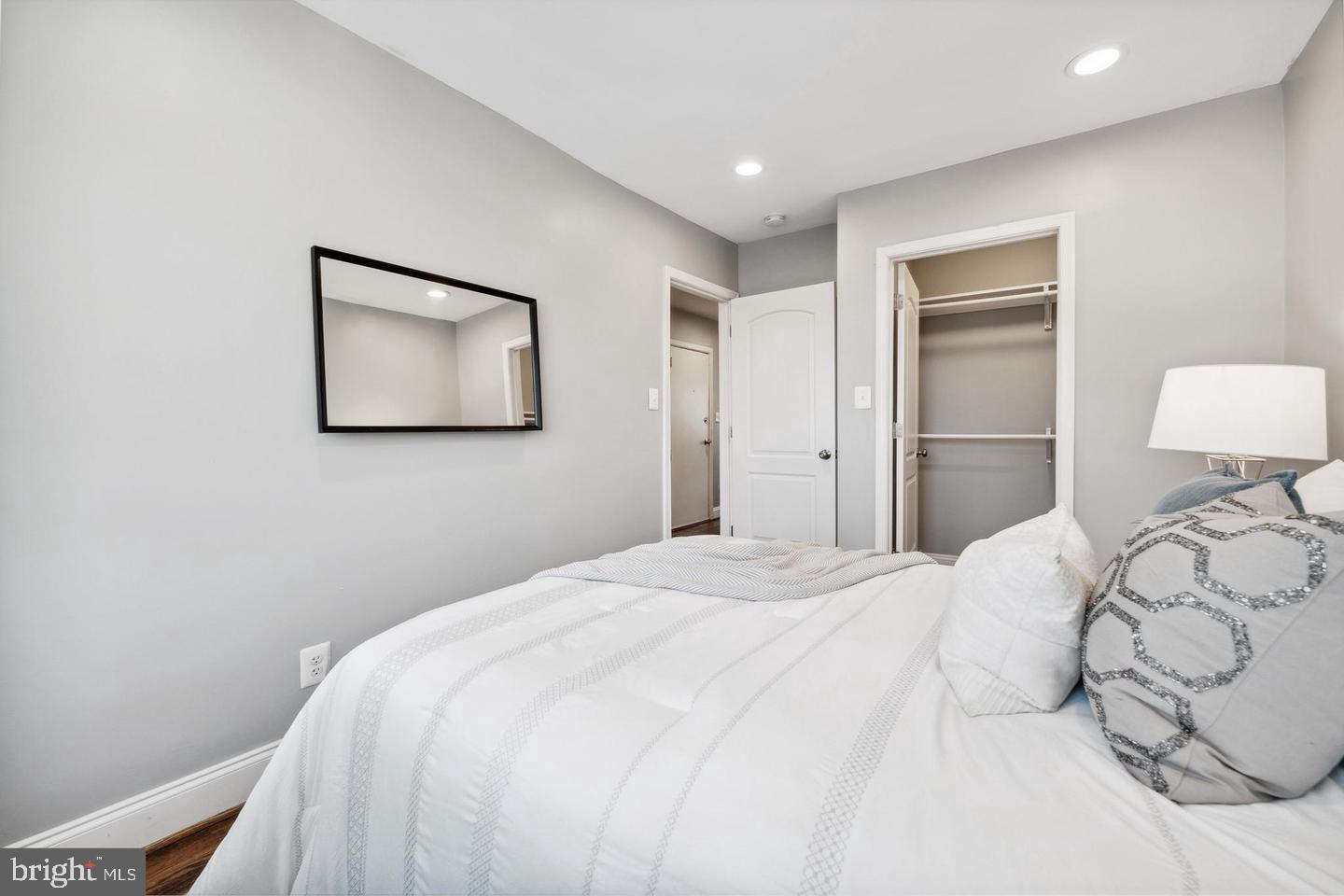 909 19th Street Northeast, Unit 2 Washington, DC 20002 - Photo 14 of 21 Serene bedroom with modern elegance.