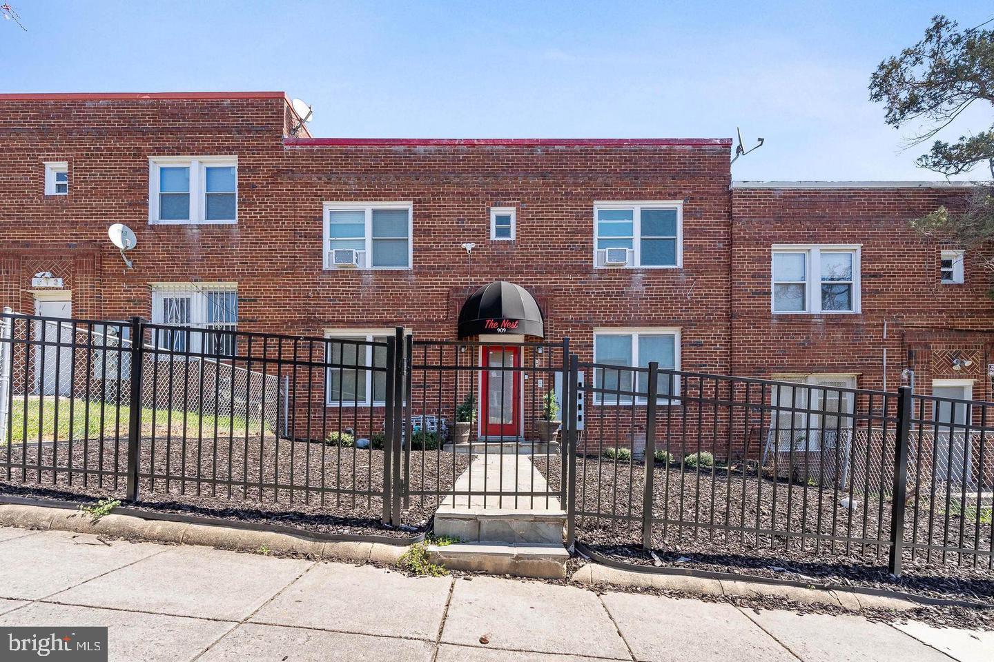 909 19th Street Northeast, Unit 2 Washington, DC 20002 - Photo 3 of 21 Charming brick apartment with gated entry.