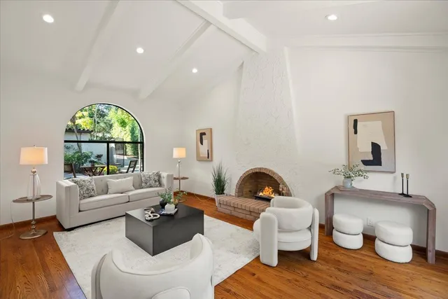 a dining room with stainless steel appliances kitchen island granite countertop furniture a dining table and chairs