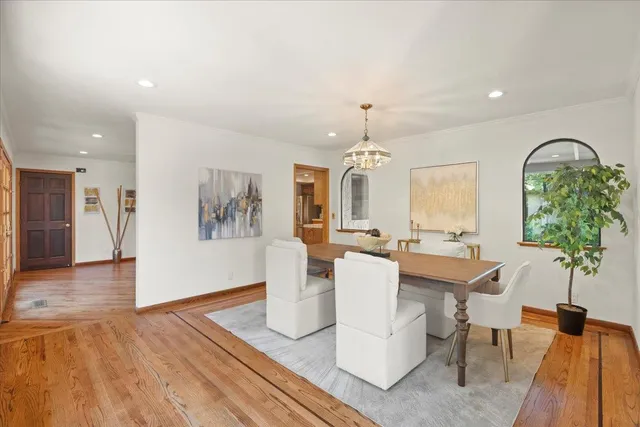a kitchen with stainless steel appliances kitchen island granite countertop a sink and cabinets