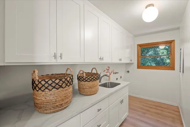 a spacious bathroom with a tub and shower