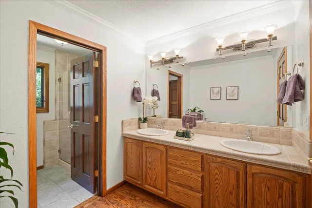 a view of a patio with a table and chairs