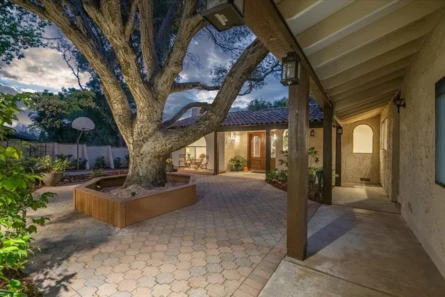 a house with trees in front of it