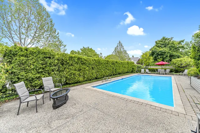 a view of a lounge chair in the garden