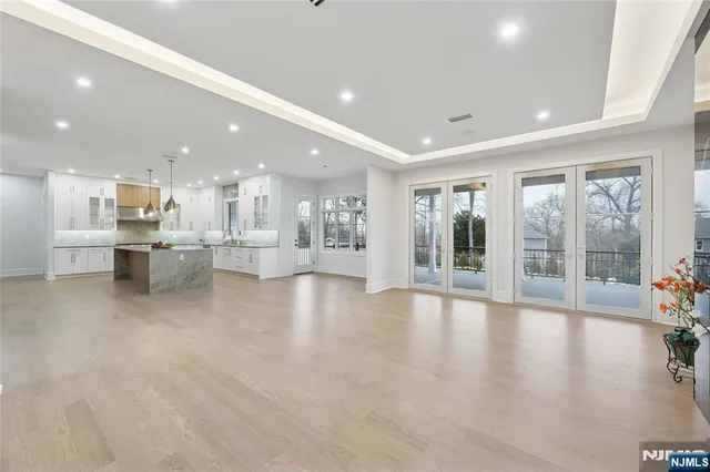 a bathroom with a toilet a sink and tub