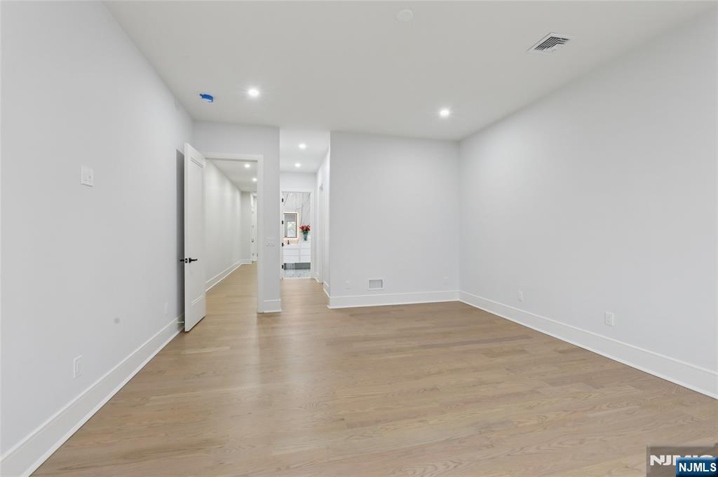 311 North Farview Avenue Paramus, NJ 07652 - Photo 19 of 50 a view of a hallway with wooden floor