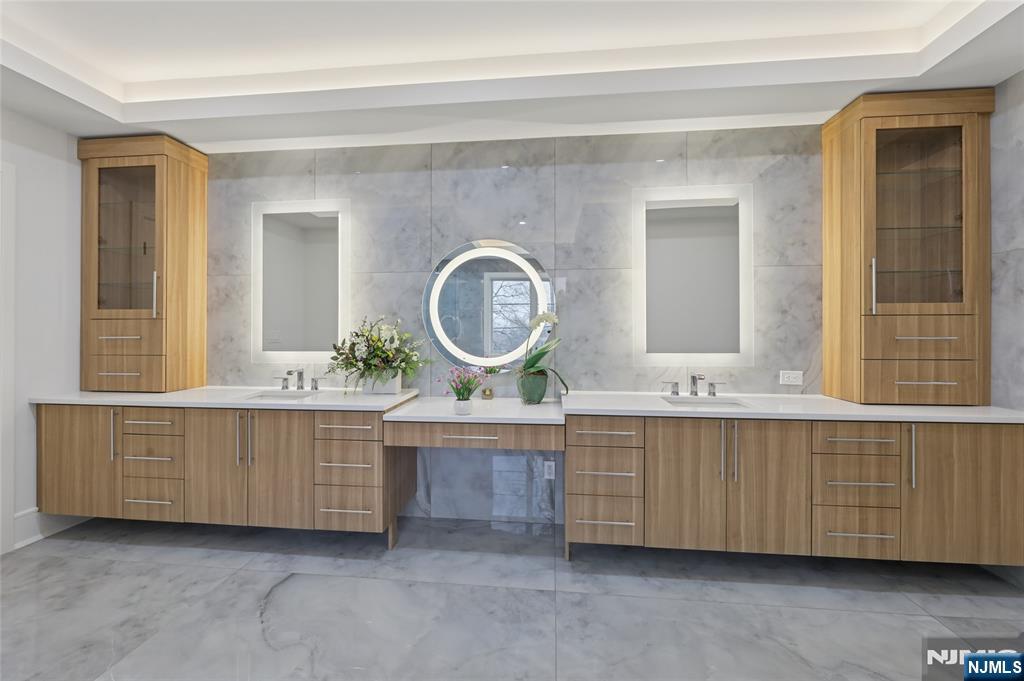 311 North Farview Avenue Paramus, NJ 07652 - Photo 28 of 50 a living room with granite countertop furniture and a mirror