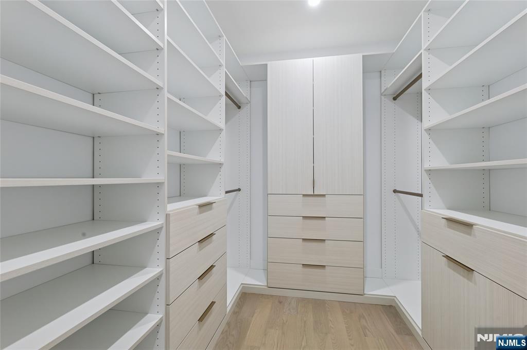 311 North Farview Avenue Paramus, NJ 07652 - Photo 30 of 50 a view of walk in closet with empty racks