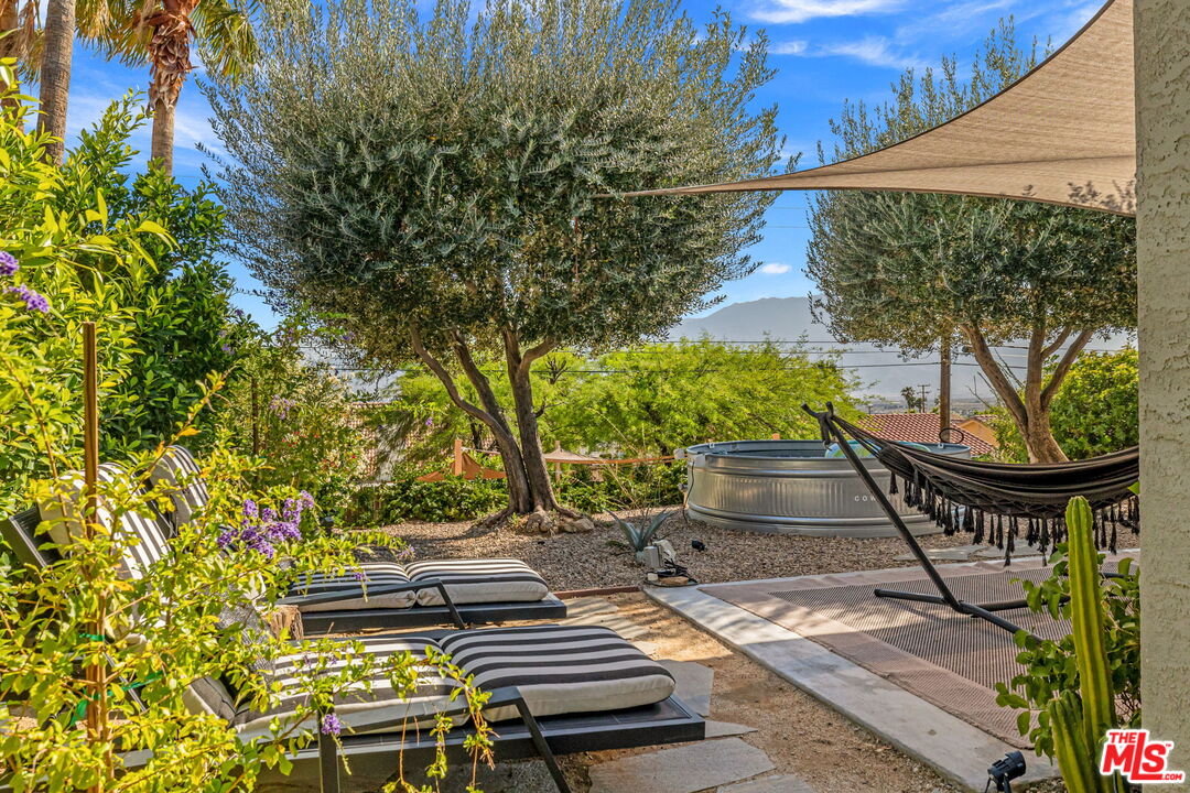 66869 San Ardo Road Desert Hot Springs, CA 92240 - Photo 6 of 39 a view of outdoor space swimming pool and outdoor seating
