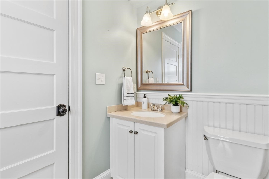 9 Governors Avenue, Unit 2 Winchester, MA 01890 - Photo 16 of 37 a bathroom with a sink a toilet and shower