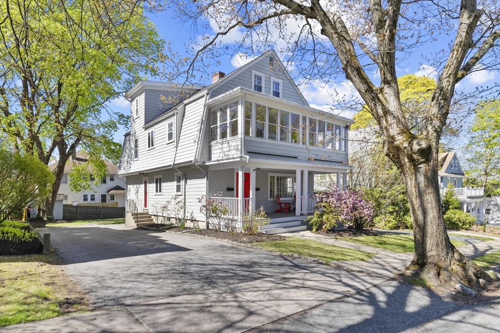 9 Governors Avenue, Unit 2 Winchester, MA 01890 - Photo 3 of 37 a front view of a building with street view and trees