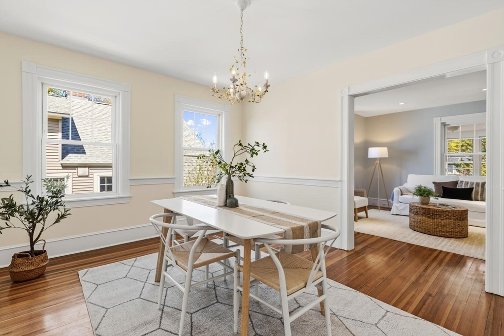 9 Governors Avenue, Unit 2 Winchester, MA 01890 - Photo 10 of 37 a view of a dining room with furniture and wooden floor