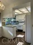 a close view of sink and cabinets