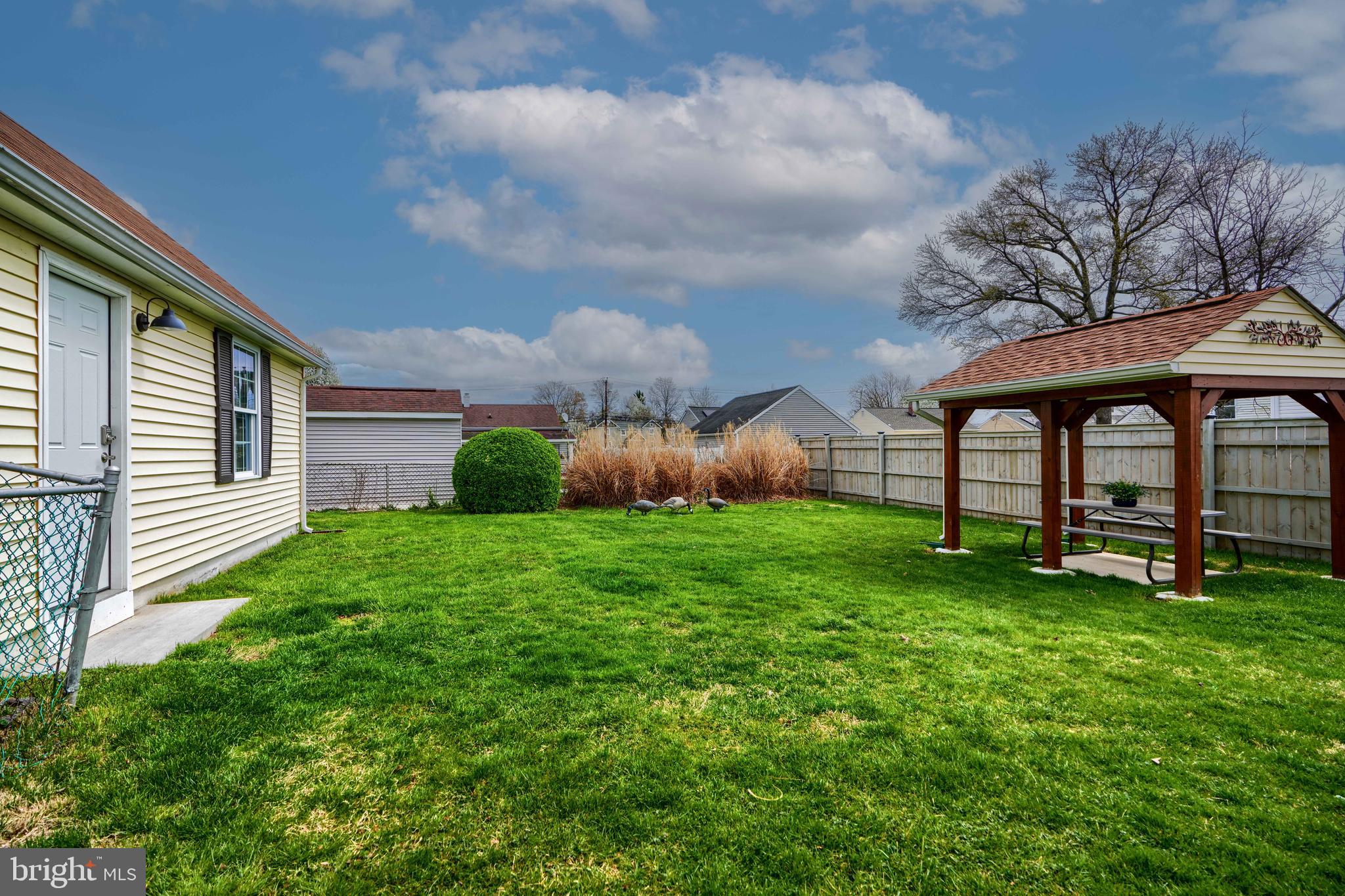 209 Middle River Road Baltimore, MD 21220 - Photo 34 of 35 a view of a backyard with sitting area