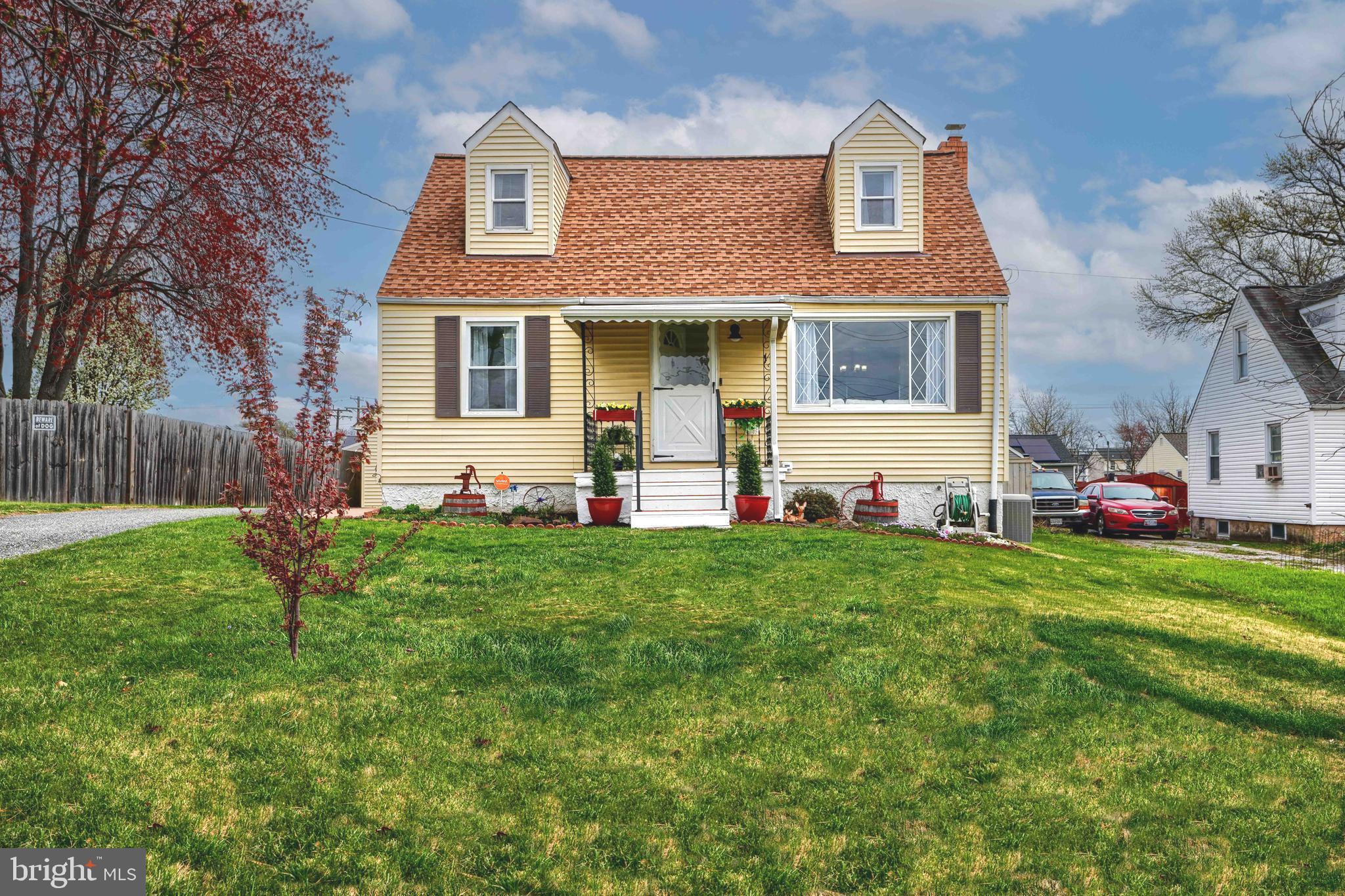 209 Middle River Road Baltimore, MD 21220 - Photo 35 of 35 a front view of house with yard and outdoor seating