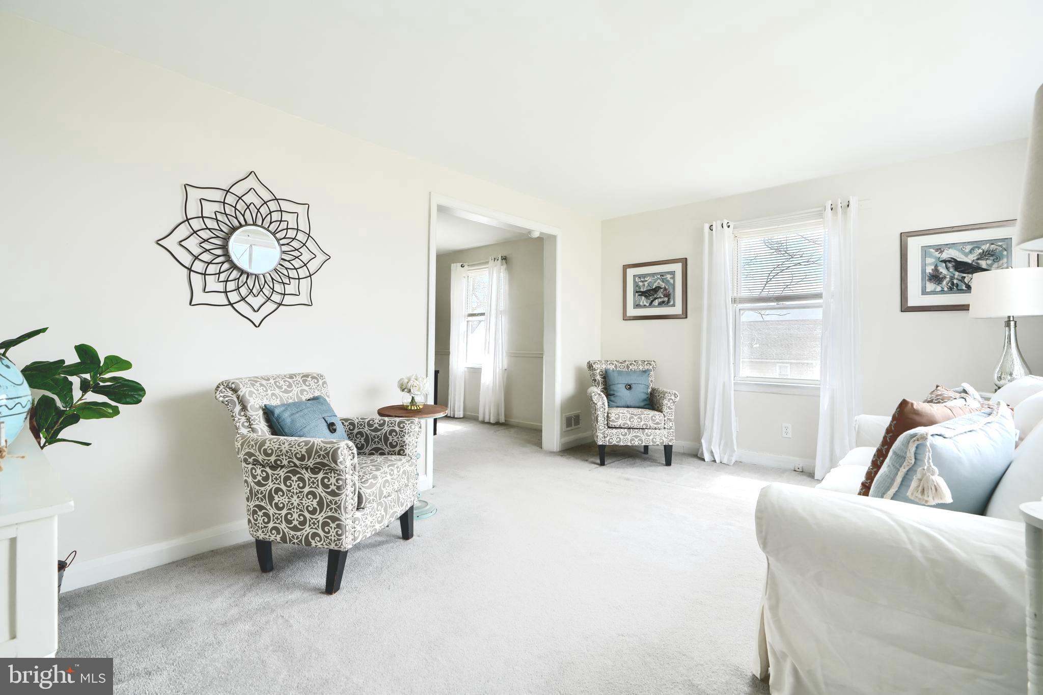 209 Middle River Road Baltimore, MD 21220 - Photo 5 of 35 a living room with furniture and a couch