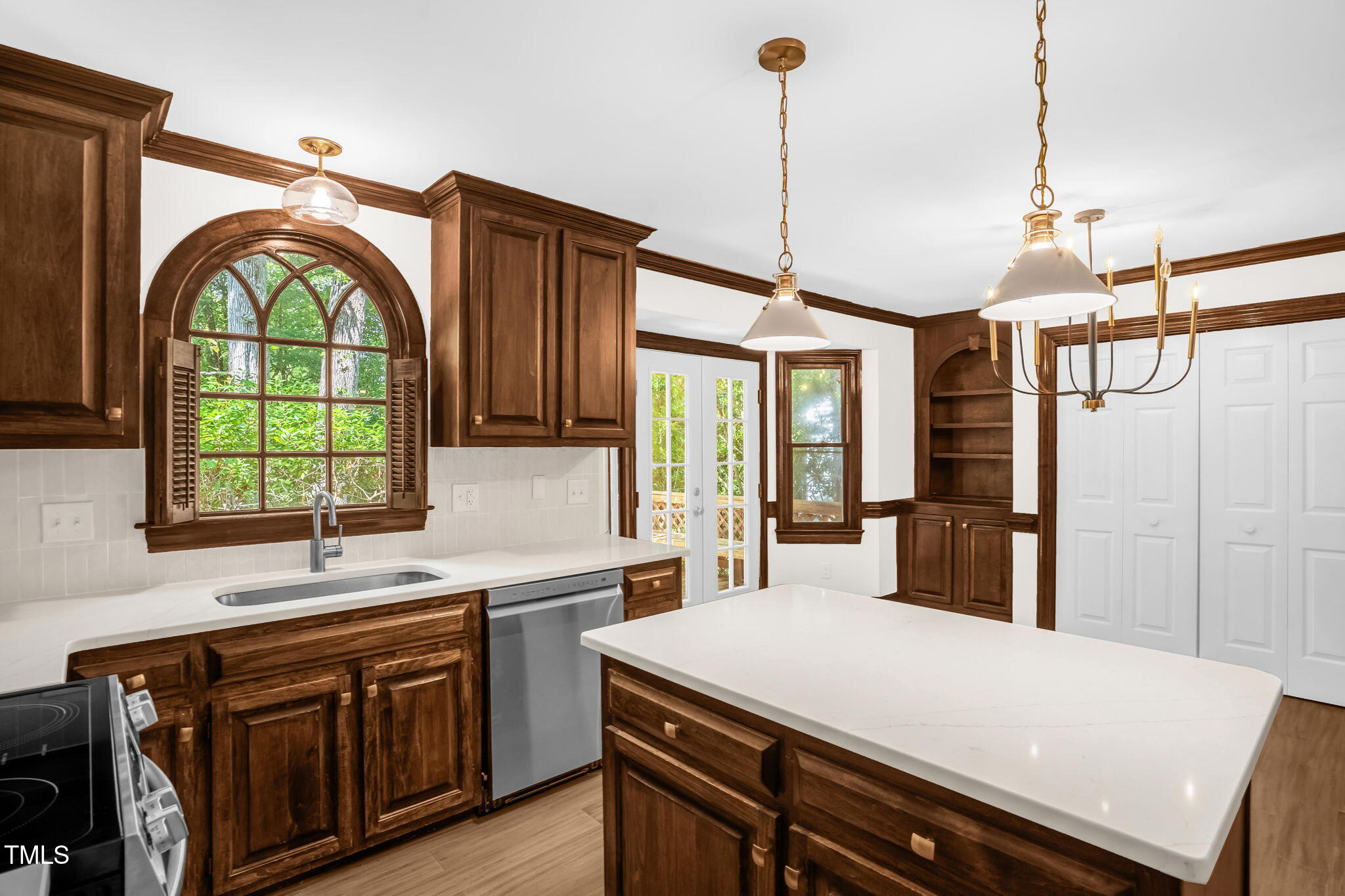 616 Cross Timbers Drive Durham, NC 27713 - Photo 15 of 29 a kitchen with a sink appliances and a window