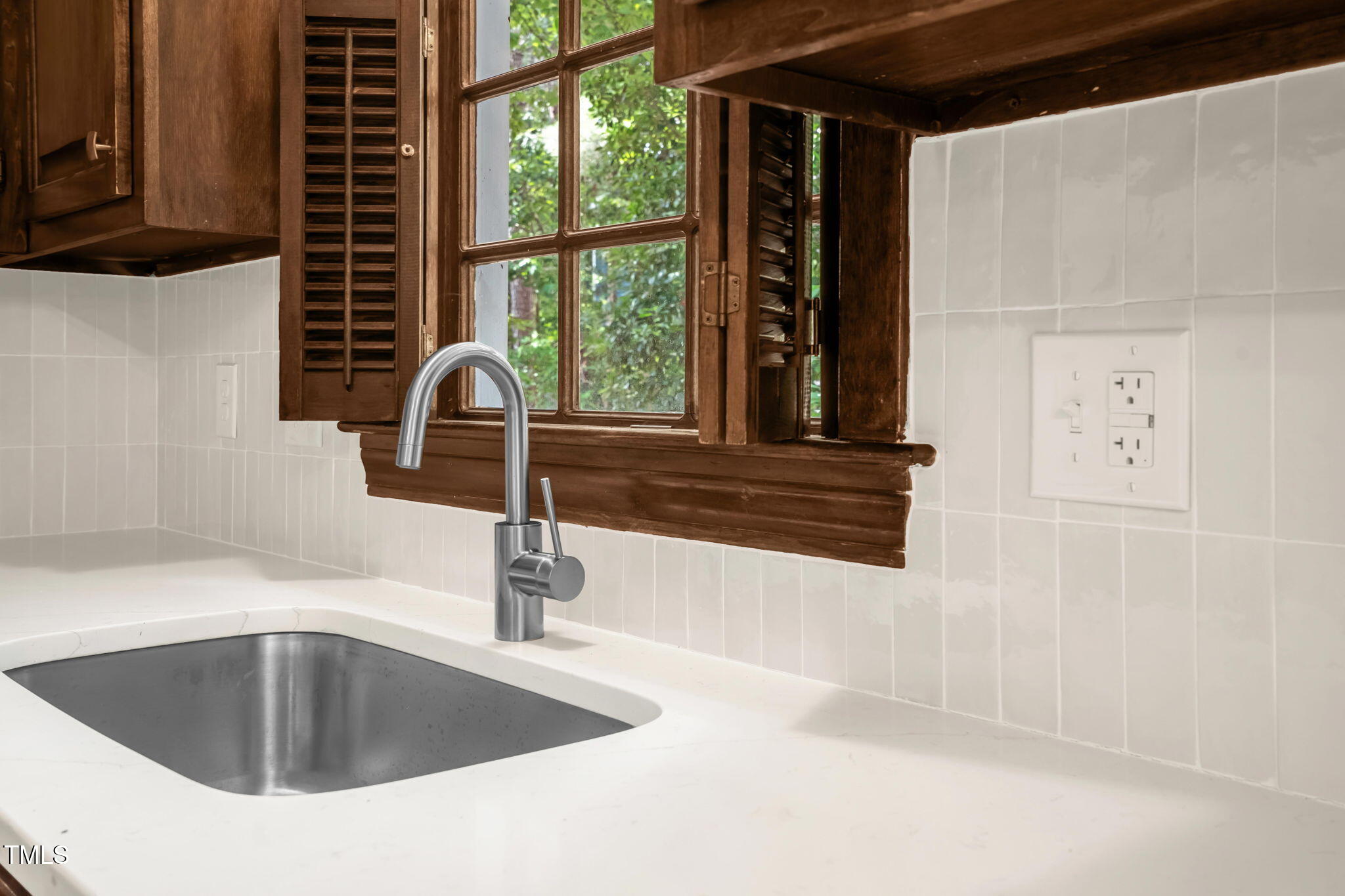 616 Cross Timbers Drive Durham, NC 27713 - Photo 19 of 29 a kitchen with a sink and a window
