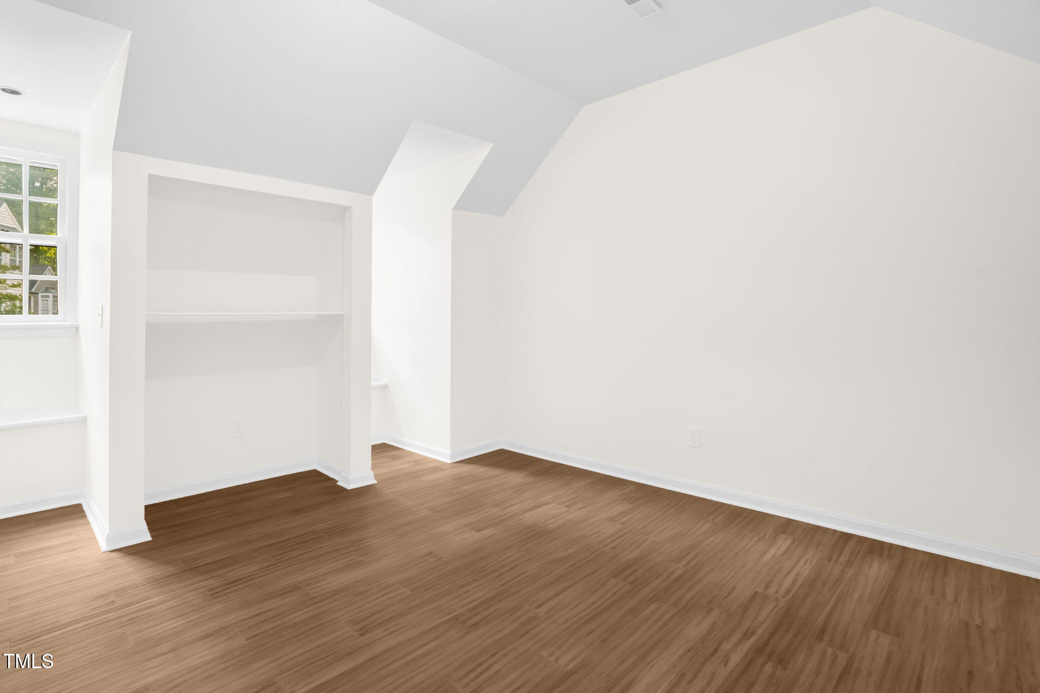 616 Cross Timbers Drive Durham, NC 27713 - Photo 26 of 29 an empty room with wooden floor